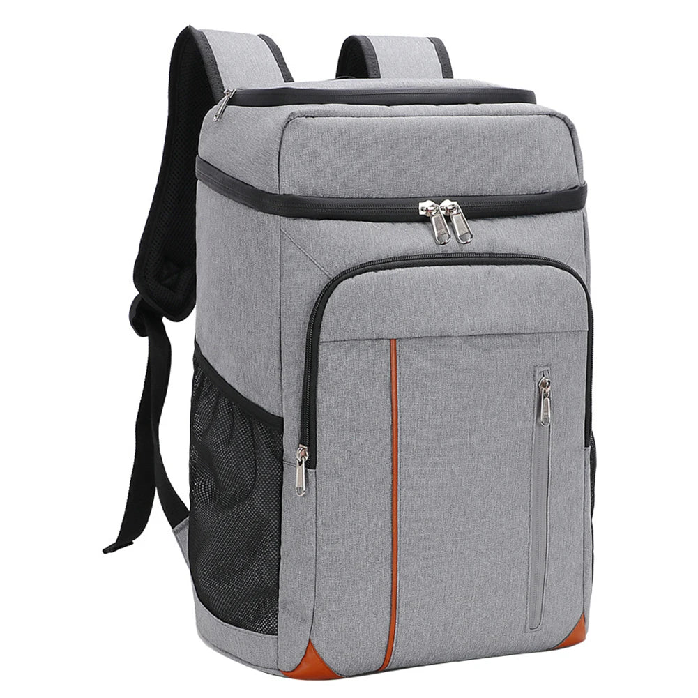 Grå ryggsäck med kylfack, perfekt för picknick, camping och resor